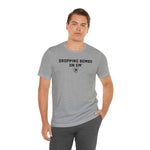 DROPPING BOMBS. T-Shirt